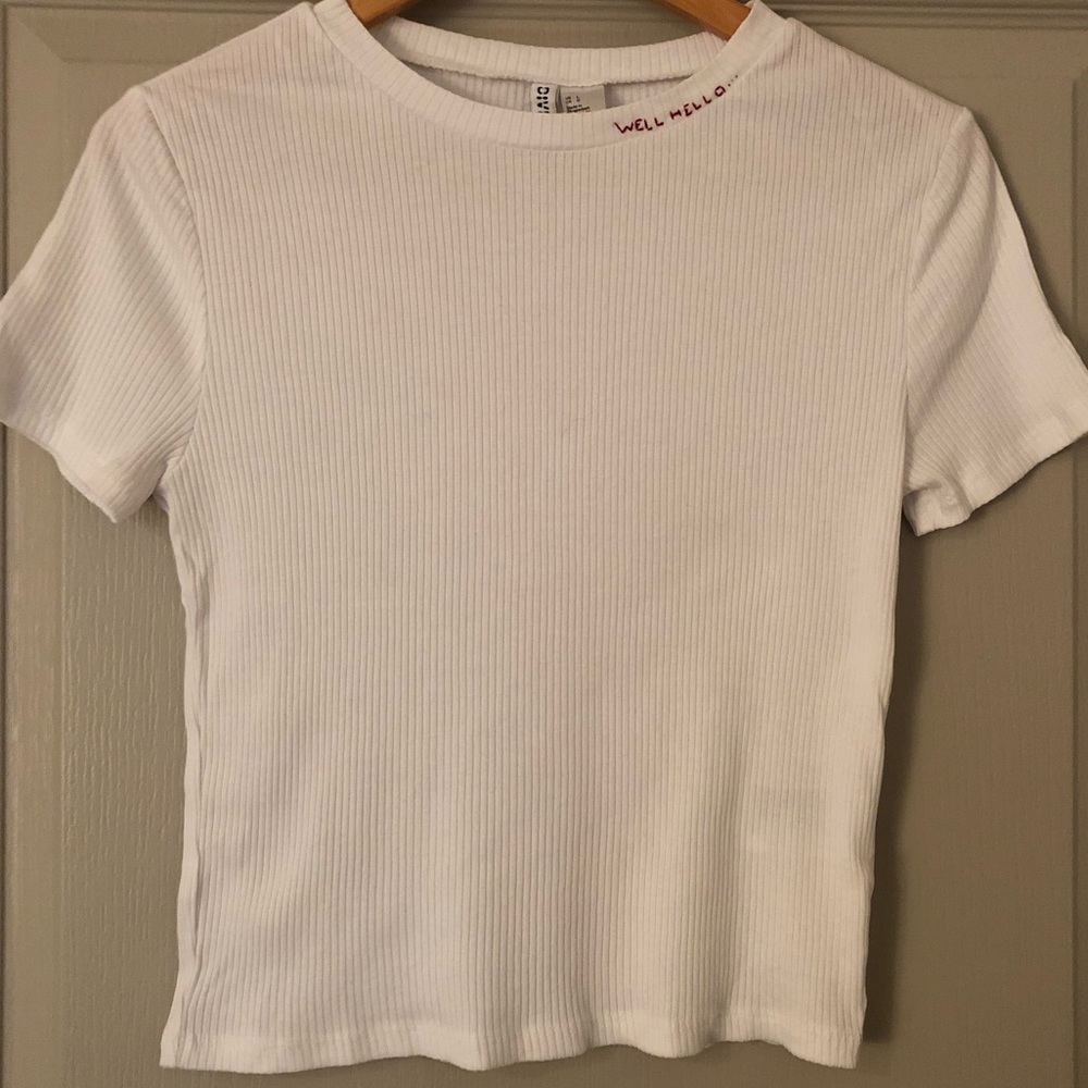 White top with simple embroidery